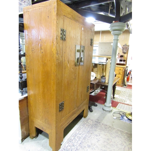 2387 - A good quality Japanese elm cupboard made from reclaimed timbers with heavily scrubbed finish, with ... 