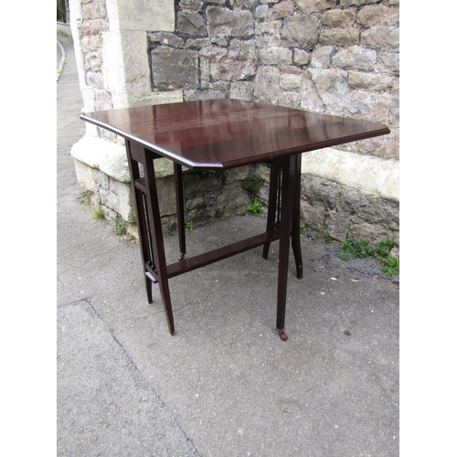 2204A - A Edwardian mahogany Sutherland type drop leaf tea table, a Queen Anne style toilet mirror, a late V... 