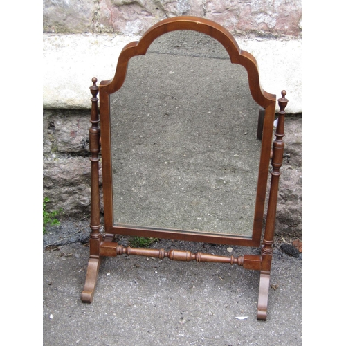 2204A - A Edwardian mahogany Sutherland type drop leaf tea table, a Queen Anne style toilet mirror, a late V... 