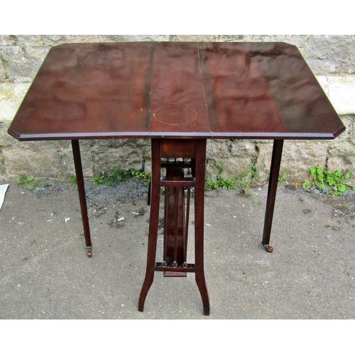 2204A - A Edwardian mahogany Sutherland type drop leaf tea table, a Queen Anne style toilet mirror, a late V... 