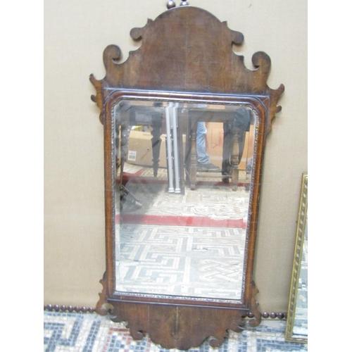 2414 - A Victorian carved rosewood framed over-mantle mirror, 71 cm high x 138 cm wide together with a Geor... 