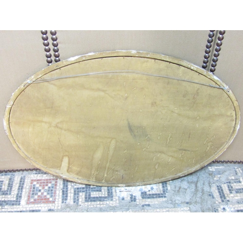 2427 - 19th century overmantle mirror of oval form with reeded and cross hatch decoration, 90cm max