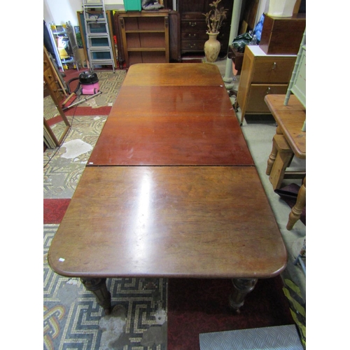 2396 - Good quality Victorian mahogany extending dining table on six turned and carved supports, the frame ... 