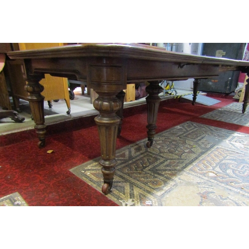 2396 - Good quality Victorian mahogany extending dining table on six turned and carved supports, the frame ... 