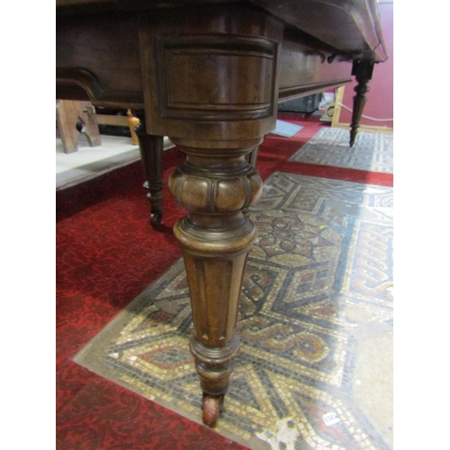 2396 - Good quality Victorian mahogany extending dining table on six turned and carved supports, the frame ... 