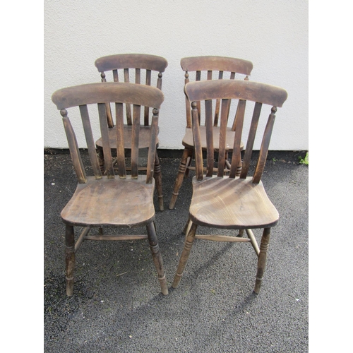 2484 - A Windsor lathe back rocking chair together with four Victorian lathe back kitchen chairs, all with ... 