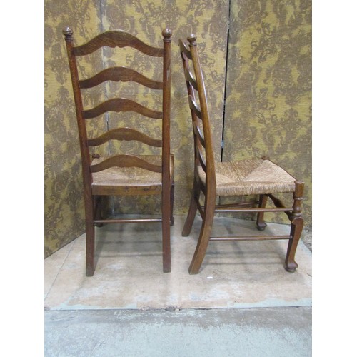 2176 - A Regency stained beechwood curved bar back lightweight open elbow chair with scrolled arms over a c... 