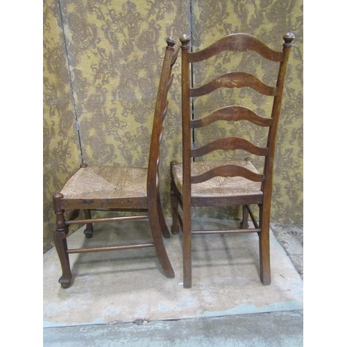 2176 - A Regency stained beechwood curved bar back lightweight open elbow chair with scrolled arms over a c... 