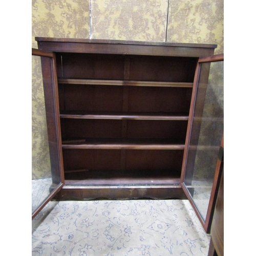 2220 - A Victorian walnut side cabinet enclosed by two glazed panelled doors with string banded inlay, 122 ... 