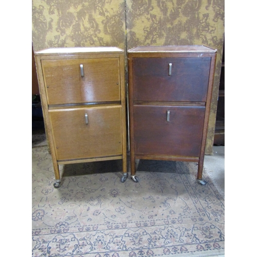 2383A - A pair of vintage oak side cabinets (possibly ex medical)raised on casters 48cm w x 43cm d x 87cm h