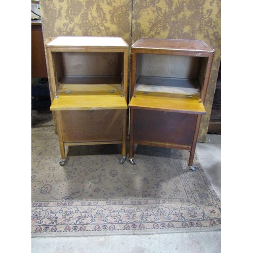 2383A - A pair of vintage oak side cabinets (possibly ex medical)raised on casters 48cm w x 43cm d x 87cm h