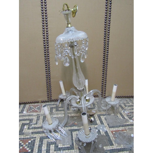 2437 - A good quality five branch cut glass chandelier with facet cut column and branches with prism and fe... 