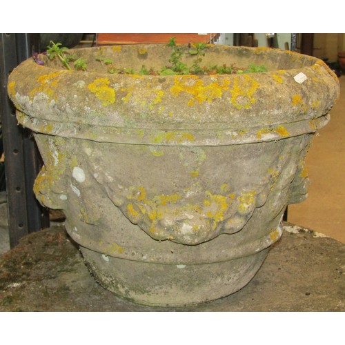 2510 - A weathered garden seat on a simulated trunk base, a number of terracotta pipes and a circular weath... 