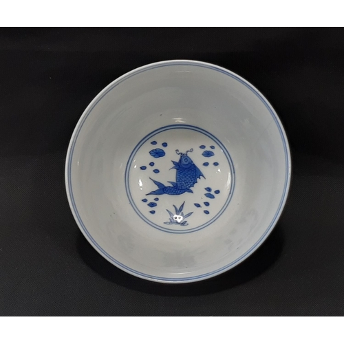 1065A - Chinese blue and white porcelain footed bowl decorated throughout with fishes, with 6 character mark... 