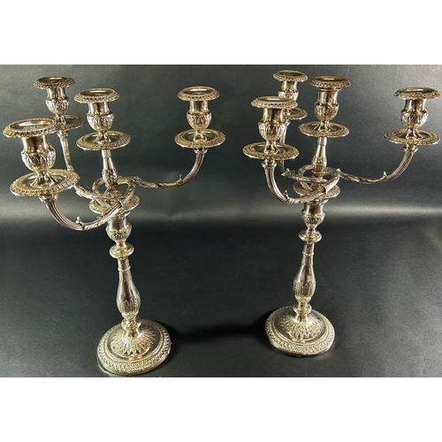 1151 - An impressive pair of Georgian style candelabra with a central column sconce and three entwined oute... 