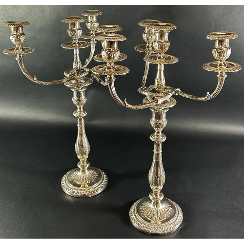 1151 - An impressive pair of Georgian style candelabra with a central column sconce and three entwined oute... 