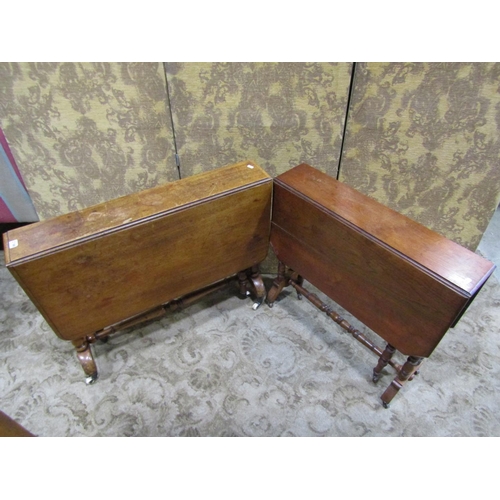 2758 - A Victorian mahogany drop leaf Sutherland tea table raised on turned supports and castors, (af), tog... 