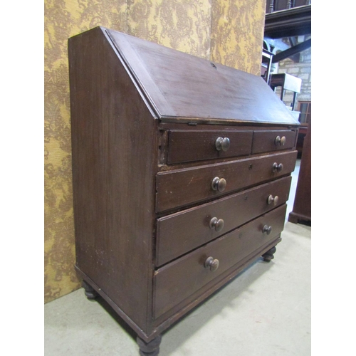 2239 - A George III pine bureau, with original stained finish, fitted with three long and two short drawers... 