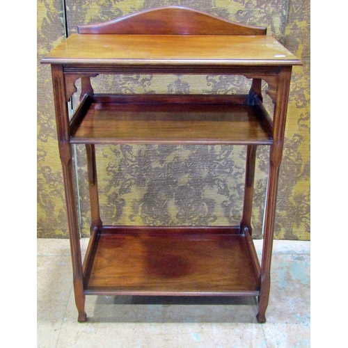 2219 - An Edwardian mahogany three tier side table with reeded column supports, 61 cm wide