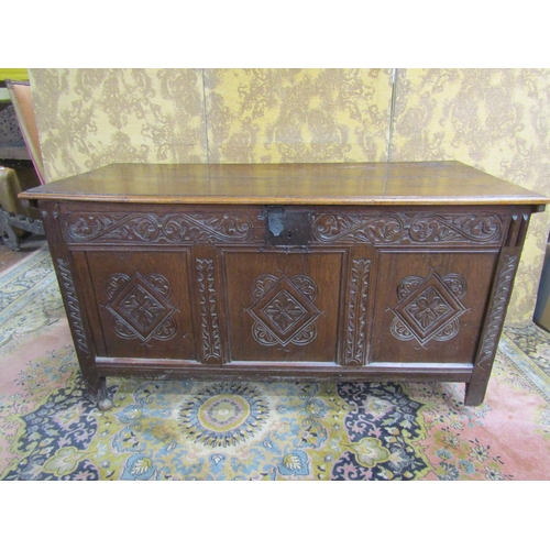 2635 - 18th century oak coffer with rising lid, the front elevation enclosed by three panels with repeating... 