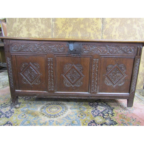 2635 - 18th century oak coffer with rising lid, the front elevation enclosed by three panels with repeating... 