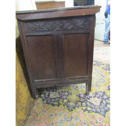 2635 - 18th century oak coffer with rising lid, the front elevation enclosed by three panels with repeating... 