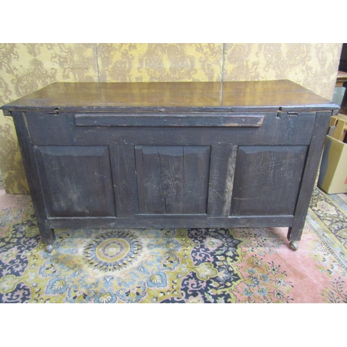 2635 - 18th century oak coffer with rising lid, the front elevation enclosed by three panels with repeating... 