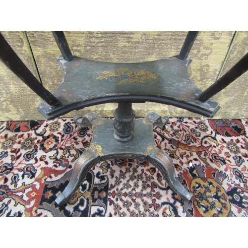 2657 - A Regency occasional table with original painted detail and applied gilded panels on two tiers with ... 