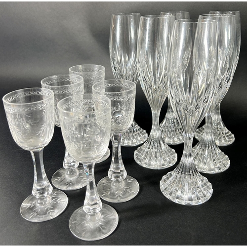 1130 - A large mixed quantity of clear-cut glassware to include six Baccarat champagne glasses, two silver ... 