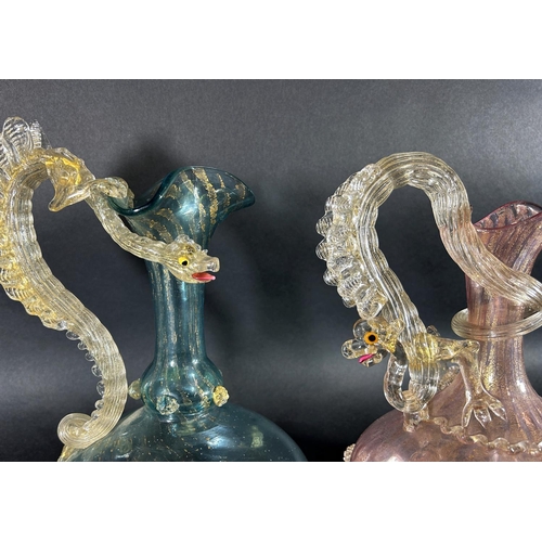 1131 - A Murano glass wine carafe in the form of a galleon, a Murano glass dolphin, two Murano glass jugs w... 