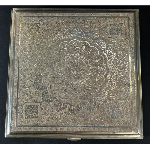 1176 - A richly engraved and incised Iranian silver box with a dedication to the inside of the lid, stamped... 