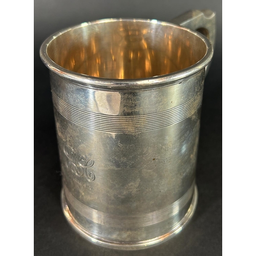 1177 - A silver pint tankard with monogram dated the 14th June 1913, Birmingham 1912, maker A & J Zimmerman... 