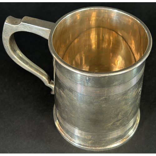 1177 - A silver pint tankard with monogram dated the 14th June 1913, Birmingham 1912, maker A & J Zimmerman... 