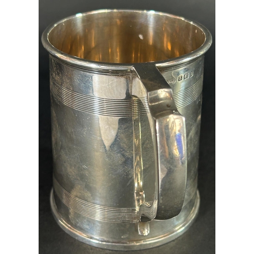 1177 - A silver pint tankard with monogram dated the 14th June 1913, Birmingham 1912, maker A & J Zimmerman... 