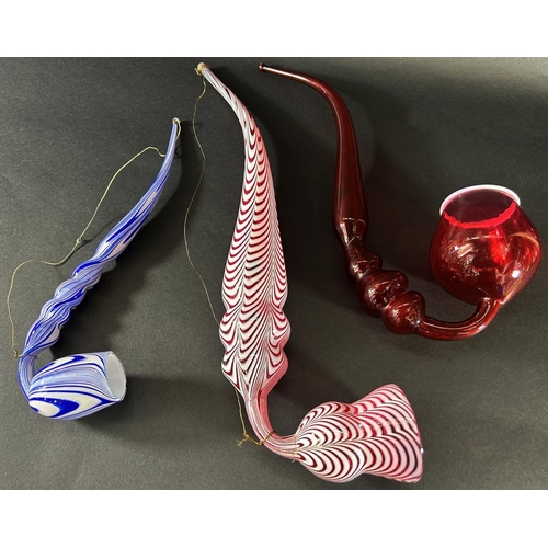 1126 - Victorian novelty glassware including a cranberry glass pipe, a Nailsea red glass pipe, Stourbridge ... 