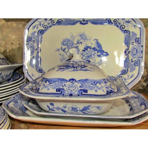 1002 - A quantity of Masons blue and white ironstone dinner wares to include to lidded serving tureens, thr... 
