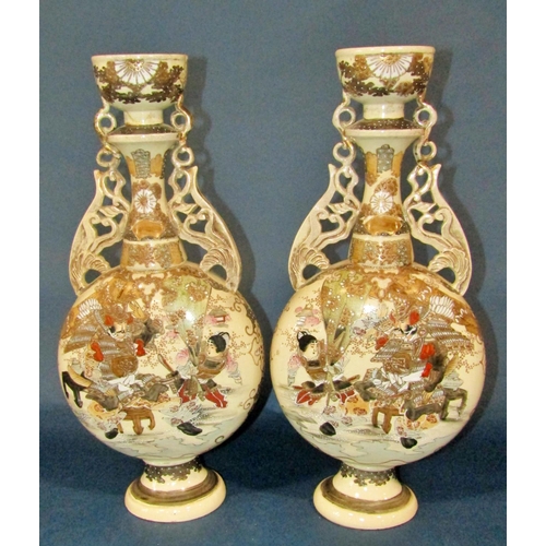 1037 - A pair of decorative early 20th century Japanese satsuma export vases of moonflask form with pierced... 