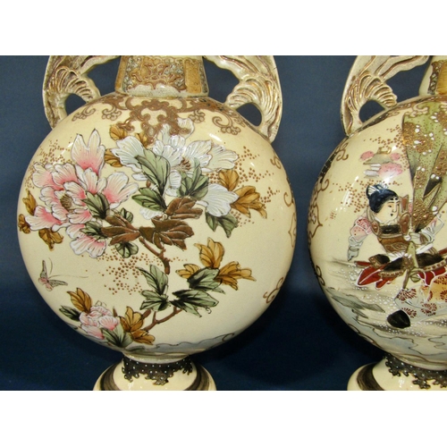 1037 - A pair of decorative early 20th century Japanese satsuma export vases of moonflask form with pierced... 