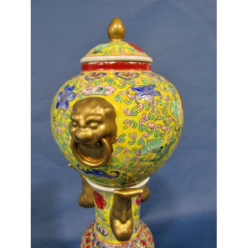 1043 - A decorative Chinese export lidded censor on stand, decorated throughout with floral motifs over a y... 