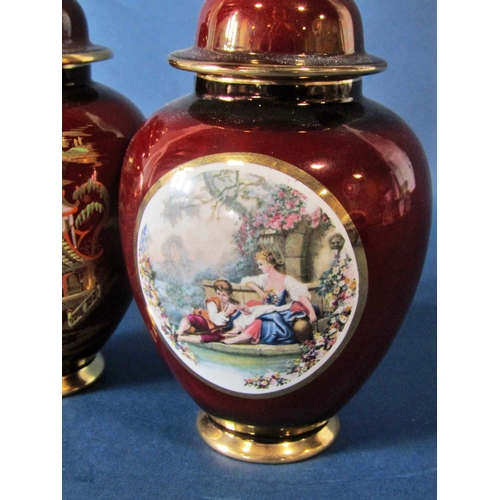 1059 - Two small carltonware red lustre vases and covers, one in the Rouge Royale pattern, each 17 cm high