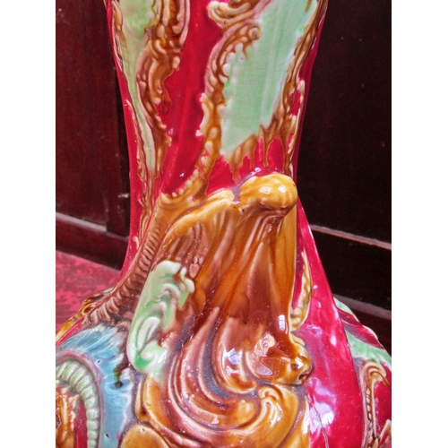 1069 - A 19th century Majolica type jardiniere stand, 62 cm high