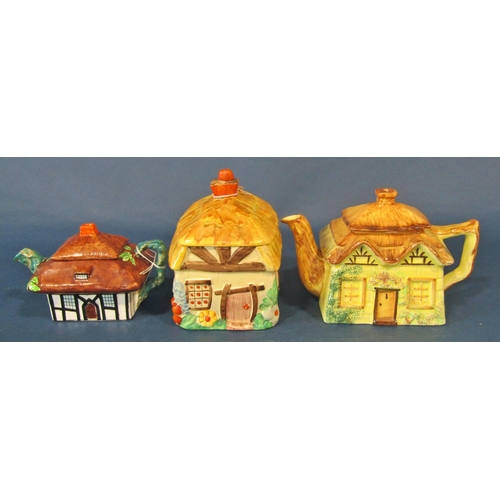 1073 - A group of cottageware porcelain items to include teapots, butter dishes, etc, also together with a ... 