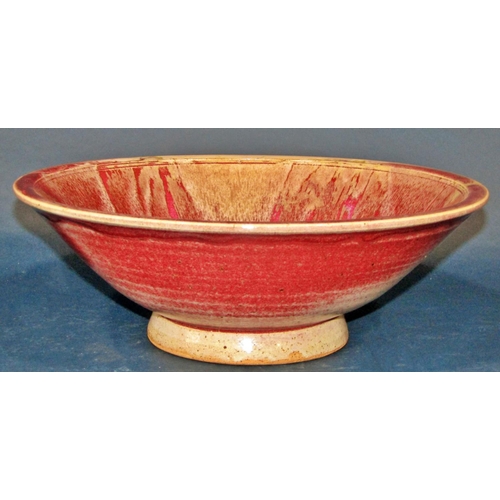 1086 - A large Studio pottery bowl with song de boeuf type glazed finish, unmarked, 11 cm high 33 cm diamet... 