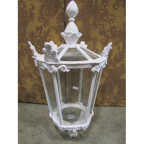 2173 - A Georgian style glazed cast iron porch lantern of hexagonal form with acanthus mounts , 70cm high