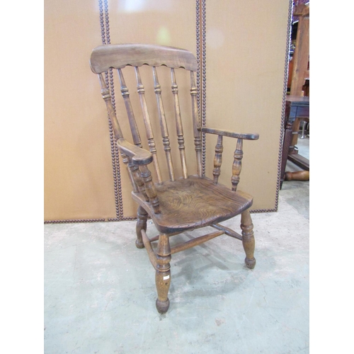 2199 - A 19th century Windsor lath back elbow chair together with a Victorian spindle back chair with cane ... 