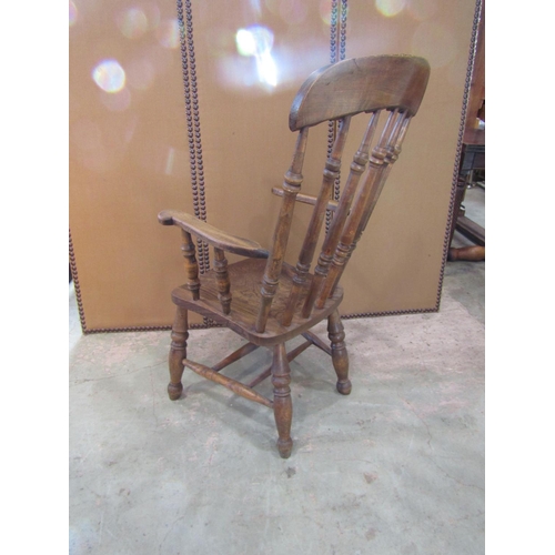 2199 - A 19th century Windsor lath back elbow chair together with a Victorian spindle back chair with cane ... 