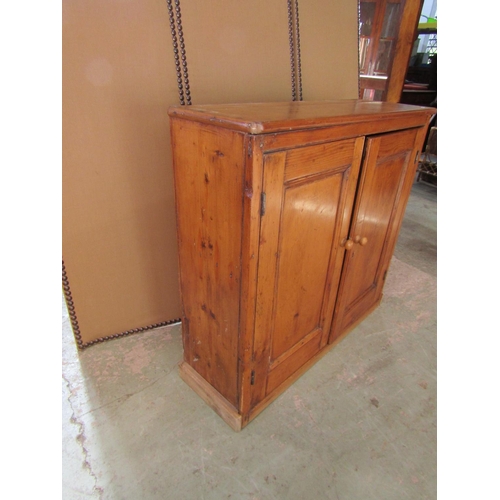 2209 - A late 19th / early 20th century pine dresser of diminutive proportions, with twin-panelled doors, a... 