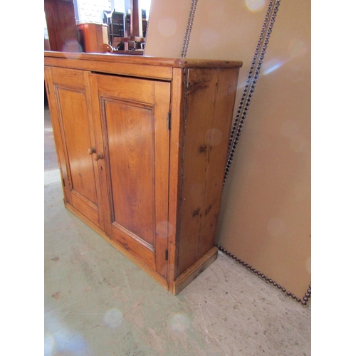 2209 - A late 19th / early 20th century pine dresser of diminutive proportions, with twin-panelled doors, a... 