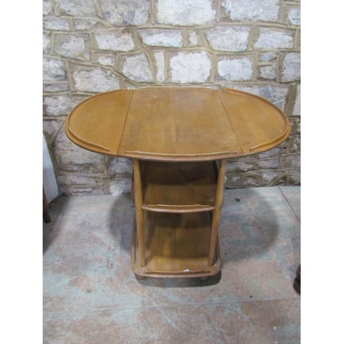 2220 - A pale Ercol tea trolley, 75cm high.