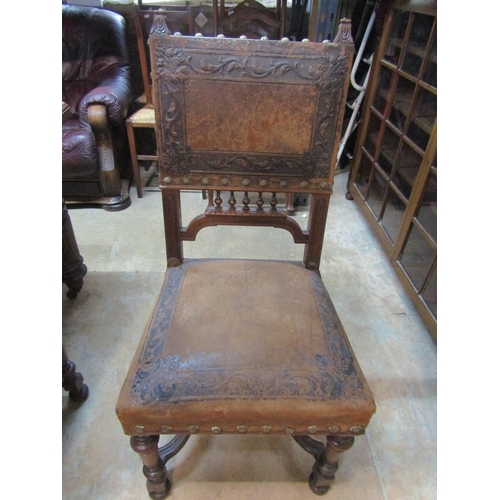 2221 - An Edwardian oak dining table, with canted corners raised on broad fluted supports and casters, 73 c... 